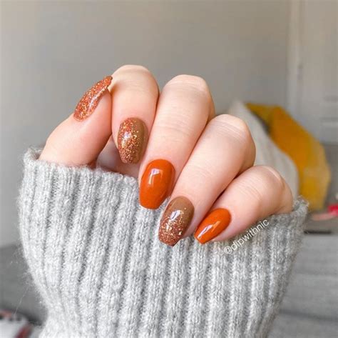 Channel Your Inner Witch with Orange Magic Nails